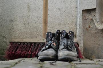 work books, shovel, broom, titus